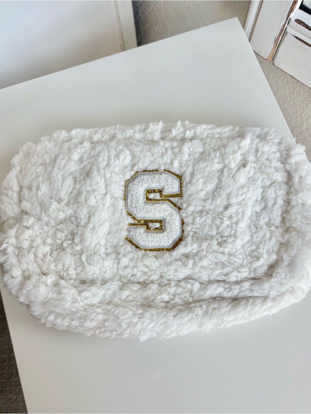 White Sherpa Cosmetic Bag with Gold 'S' Accent